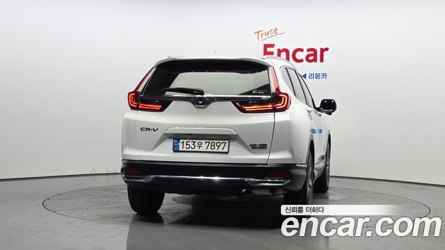 Honda CR-V (V) 2.0 Hybrid Touring 4WD 2021 — фото 4