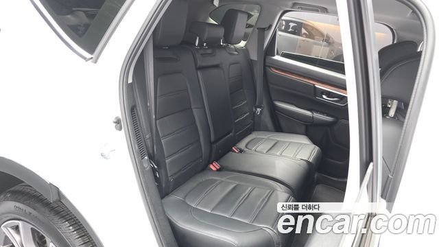 Honda CR-V (V) 2.0 Hybrid Touring 4WD 2021 — фото 11