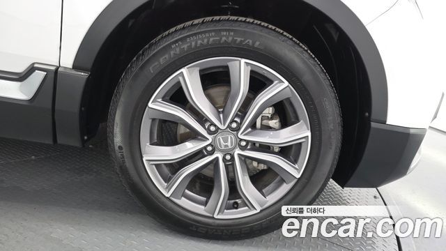 Honda CR-V (V) 2.0 Hybrid Touring 4WD 2021 — фото 21