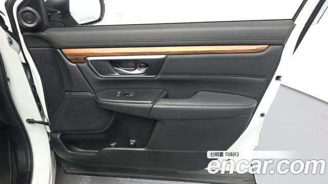 Honda CR-V (V) 2.0 Hybrid Touring 4WD 2021 — фото 24
