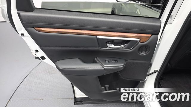 Honda CR-V (V) 2.0 Hybrid Touring 4WD 2021 — фото 25