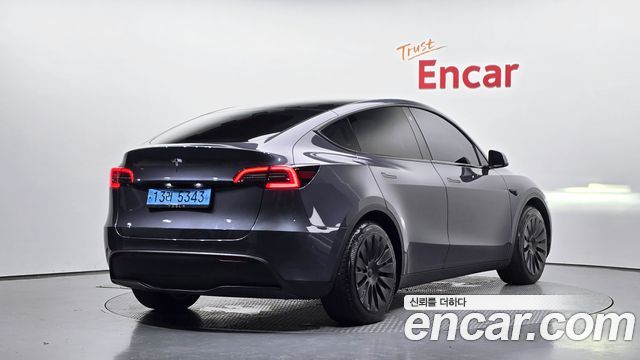 Tesla Model Y RWD 2024 — фото 2
