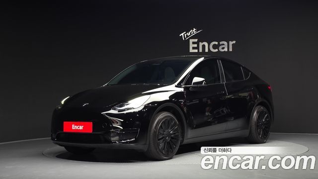 Tesla Model Y RWD 2024 — фото 1