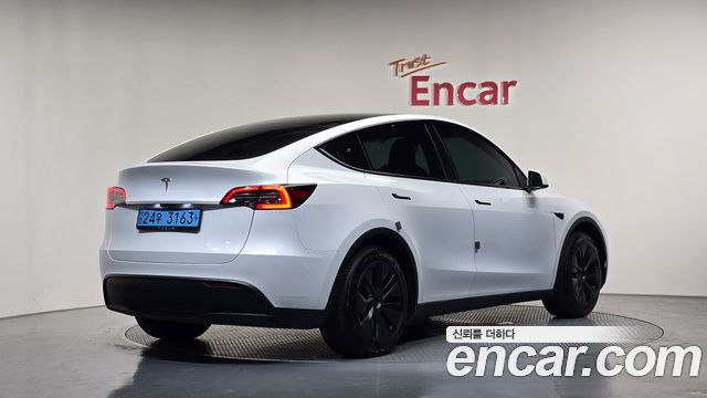 Tesla Model Y RWD 2024 — фото 2