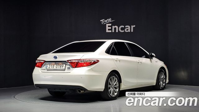 Toyota Camry Hybrid XLE 2016 — фото 2