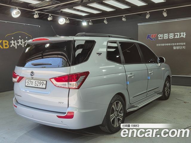 KG Mobility (SsangYong) Korando Turismo 4WD RX 9-seater 2014 — фото 4