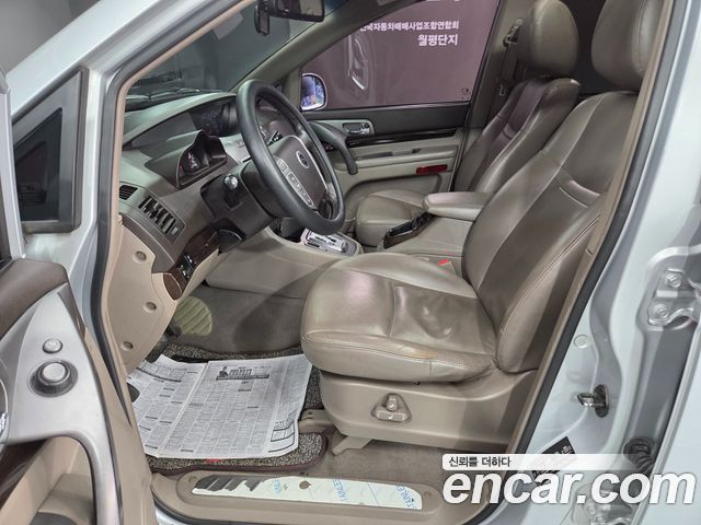 KG Mobility (SsangYong) Korando Turismo 4WD RX 9-seater 2014 — фото 6