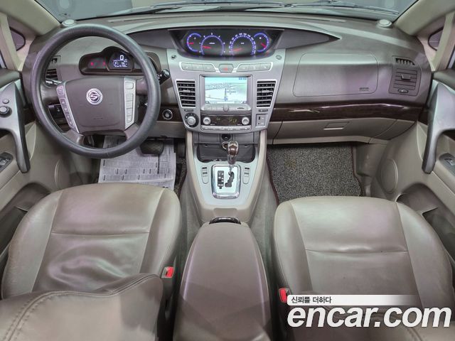 KG Mobility (SsangYong) Korando Turismo 4WD RX 9-seater 2014 — фото 8