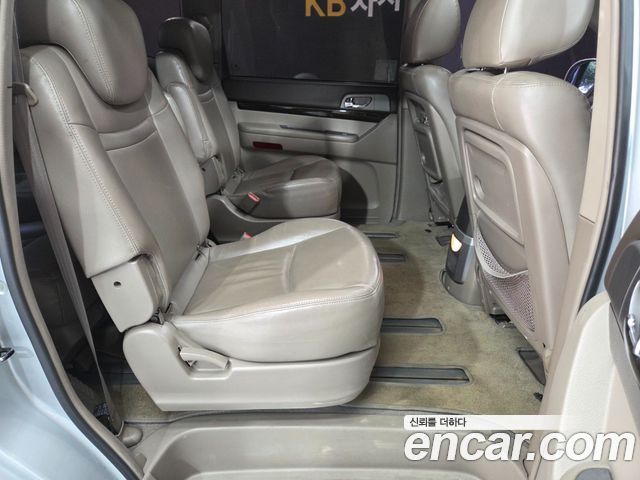 KG Mobility (SsangYong) Korando Turismo 4WD RX 9-seater 2014 — фото 9