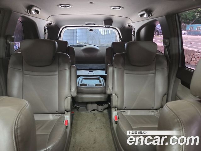 KG Mobility (SsangYong) Korando Turismo 4WD RX 9-seater 2014 — фото 10