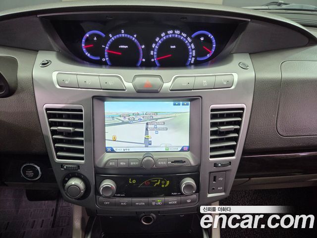 KG Mobility (SsangYong) Korando Turismo 4WD RX 9-seater 2014 — фото 16