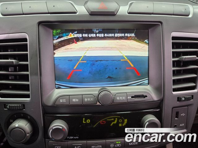 KG Mobility (SsangYong) Korando Turismo 4WD RX 9-seater 2014 — фото 17