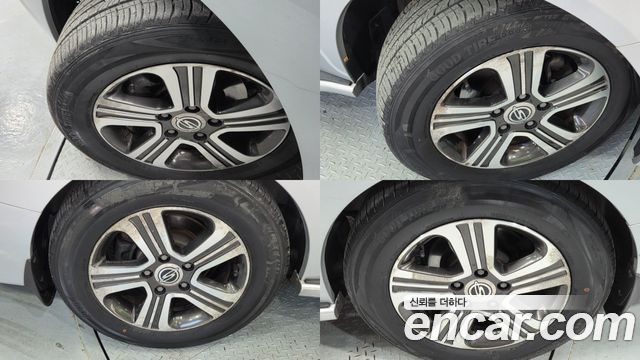 KG Mobility (SsangYong) Korando Turismo 4WD RX 9-seater 2014 — фото 20