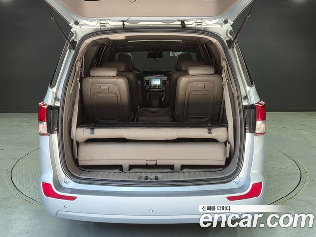 KG Mobility (SsangYong) Korando Turismo 4WD RX 9-seater 2014 — фото 21