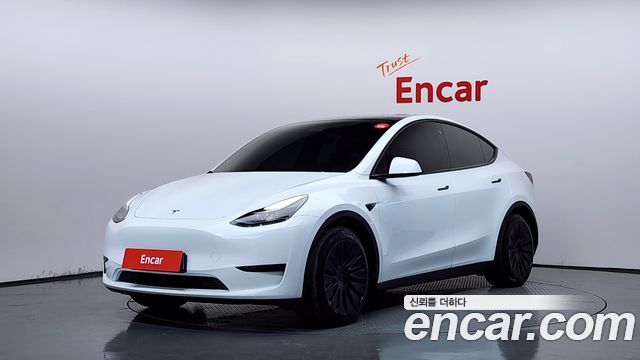 Tesla Model Y RWD 2024 — фото 1