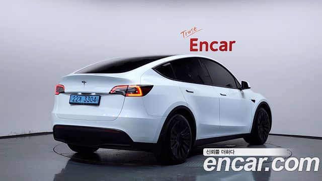 Tesla Model Y RWD 2024 — фото 2