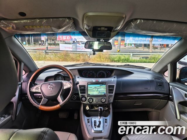 KG Mobility (SsangYong) Korando Turismo 4WD TX 11-seater 2016 — фото 8