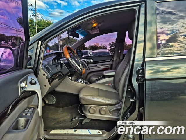 KG Mobility (SsangYong) Korando Turismo 4WD TX 11-seater 2016 — фото 21