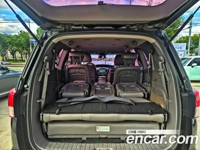 KG Mobility (SsangYong) Korando Turismo 4WD TX 11-seater 2016 — фото 23