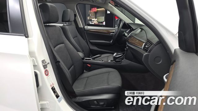 BMW X1 (E84) xDrive 18d 2014 — фото 11