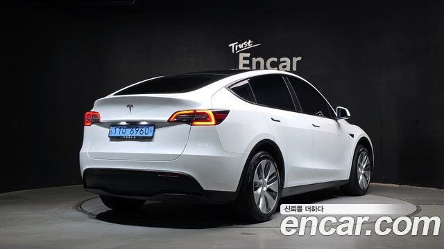 Tesla Model Y RWD 2023 — фото 2