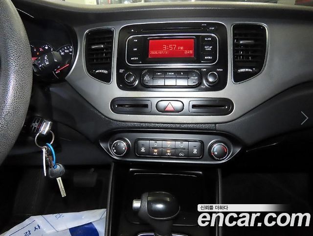 Kia Carens 1.7 VGT Deluxe 2014 — фото 16