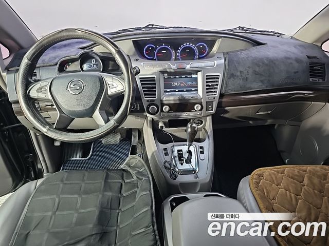 KG Mobility (SsangYong) Korando Turismo 4WD RX 9-seater 2016 — фото 5