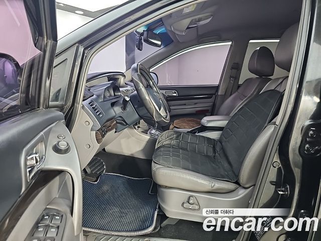KG Mobility (SsangYong) Korando Turismo 4WD RX 9-seater 2016 — фото 15