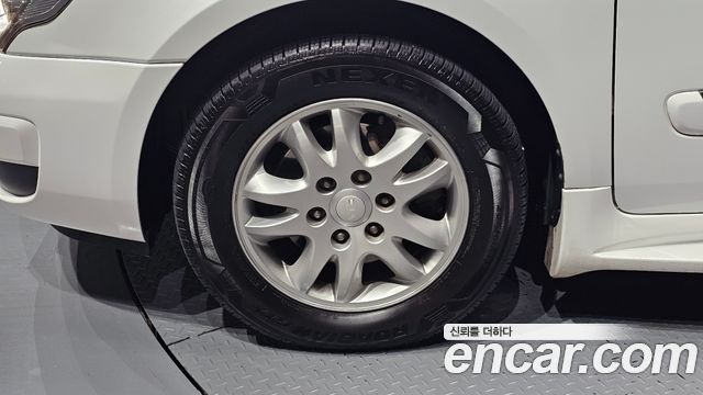 Kia Carnival R New Carnival Limousine GLX High-Deluxe 2013 — фото 5
