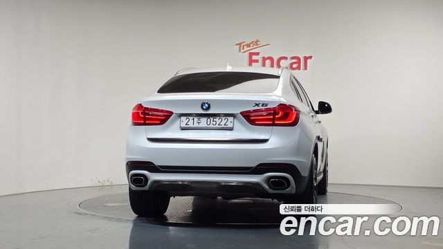 BMW X6 (F16) xDrive 40d 2016 — фото 4