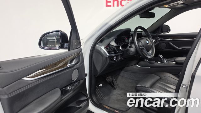 BMW X6 (F16) xDrive 40d 2016 — фото 10