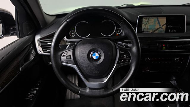 BMW X6 (F16) xDrive 40d 2016 — фото 13