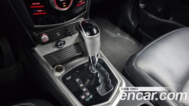 KG Mobility (SsangYong) Tivoli VX 2WD 2015 — фото 9