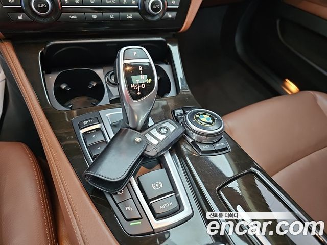 BMW 5 Series (F10) 528i xDrive 2014 — фото 9