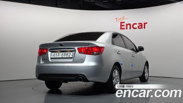 Kia Forte 1.6 GDI Deluxe ECO Plus 2011 — фото 2