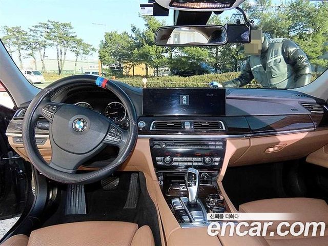 BMW 7 Series (F01) 740d 2013 — фото 7