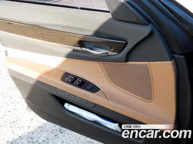 BMW 7 Series (F01) 740d 2013 — фото 16
