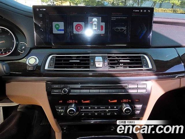 BMW 7 Series (F01) 740d 2013 — фото 18