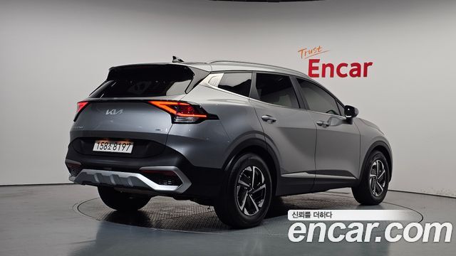 Kia Sportage Hybrid (V) Prestige 2023 — фото 2