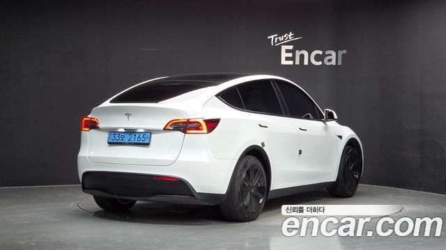 Tesla Model Y RWD 2024 — фото 2