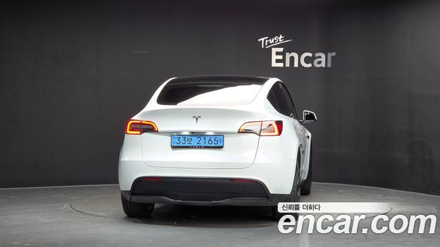 Tesla Model Y RWD 2024 — фото 4