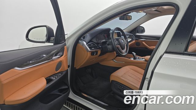 BMW X6 (F16) xDrive 30d 2016 — фото 10