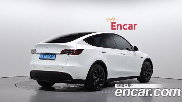 Tesla Model Y RWD 2023 — фото 2
