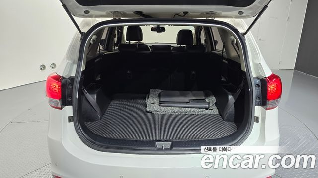 Kia Carens 2.0 LPi Prestige 2015 — фото 32