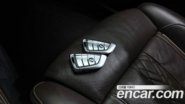 BMW 7 Series (G11) 740d xDrive M Sport 2018 — фото 16
