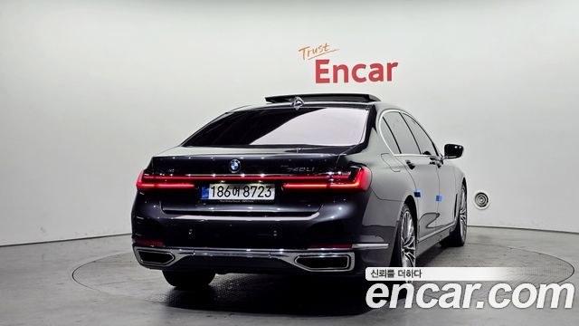 BMW 7 Series (G11) 740Li xDrive Design Pure Excellence 2021 — фото 4