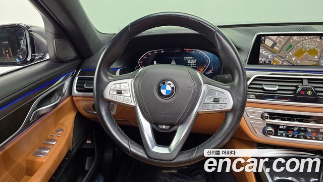 BMW 7 Series (G11) 740Li xDrive Design Pure Excellence 2021 — фото 13