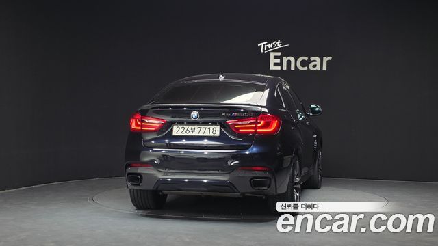 BMW X6 (F16) M50d 2015 — фото 4