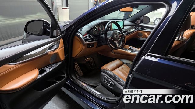 BMW X6 (F16) M50d 2015 — фото 10