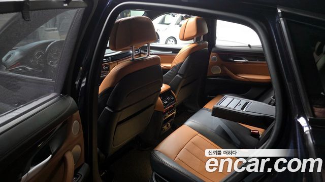 BMW X6 (F16) M50d 2015 — фото 15